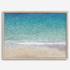 This fine art aerial beach print showcases the mesmerizing colors of the ocean in vivid detail. From the deep blue depths to the vibrant greenish turquoise blue, transitioning to the golden sandy beach and the crashing white surf.