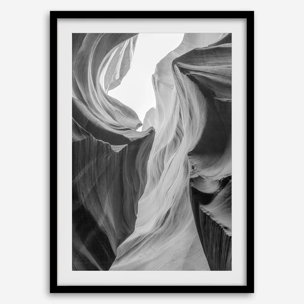 Black and white Antelope Canyon wall art showcasing deep shadows and intricate rock formations in Arizona’s iconic slot canyon.