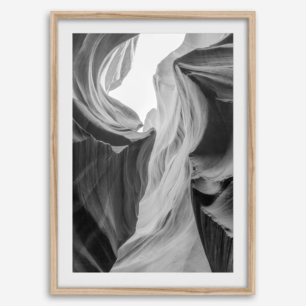 Black and white Antelope Canyon wall art showcasing deep shadows and intricate rock formations in Arizona’s iconic slot canyon.