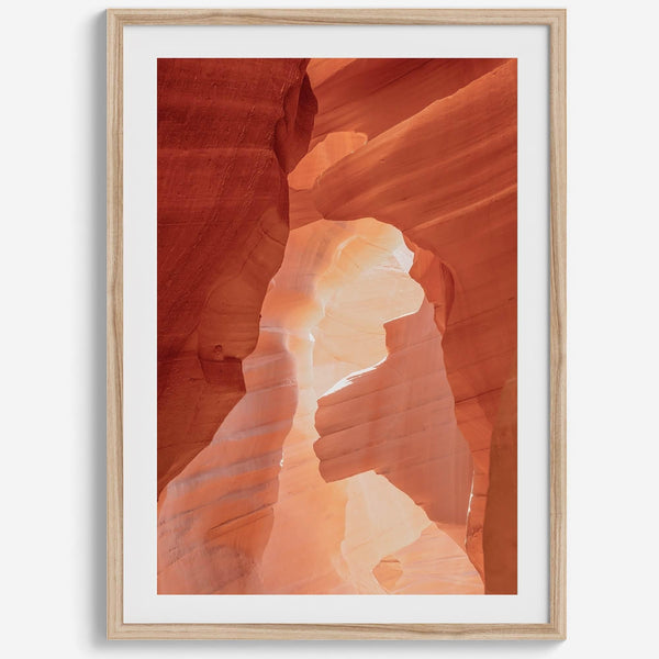 A fine art Arizona Desert print showcasing Antelope Canyon in Arizona. The three layers of rocks in varying colors and creamy textures create a stunning minimalist desert landscape, with vibrant reds and oranges adding warmth to any space.