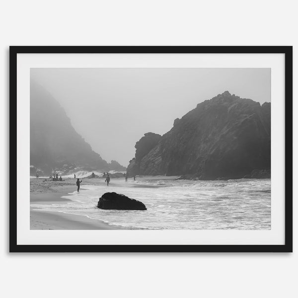 A framed black and white print of the beautiful Pfeiffer Beach in Big Sur hung in the living room. This wall art showcases the dramatic rocks and mist of the Big Sur coastline and the day-to-day life of the beach.