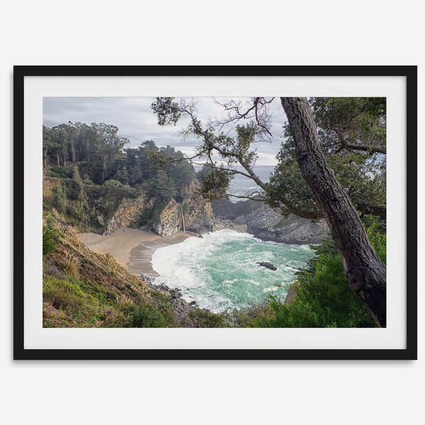 This fine art coastal ocean print features a breathtaking view of Mcway Falls in Big Sur, California, falling to the beach and into the ocean. This fine art photography print captures the beauty and wilderness of nature.