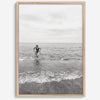 A black and white fine art lake beach print of a beach in Chicago on the coast of Lake Michigan showcasing a woman bathing in the lake. The classic modern look of the print is sure to impress when hung on your walls.