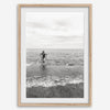 A black and white fine art lake beach print of a beach in Chicago on the coast of Lake Michigan showcasing a woman bathing in the lake. The classic modern look of the print is sure to impress when hung on your walls.