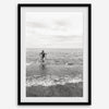 A black and white fine art lake beach print of a beach in Chicago on the coast of Lake Michigan showcasing a woman bathing in the lake. The classic modern look of the print is sure to impress when hung on your walls.