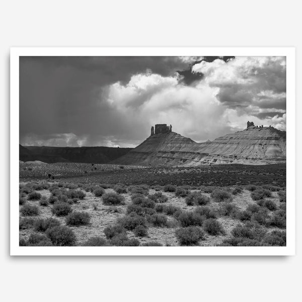 Black and white Utah wall art featuring dramatic desert rock formations and storm clouds