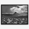 Black and white Utah wall art featuring dramatic desert rock formations and storm clouds