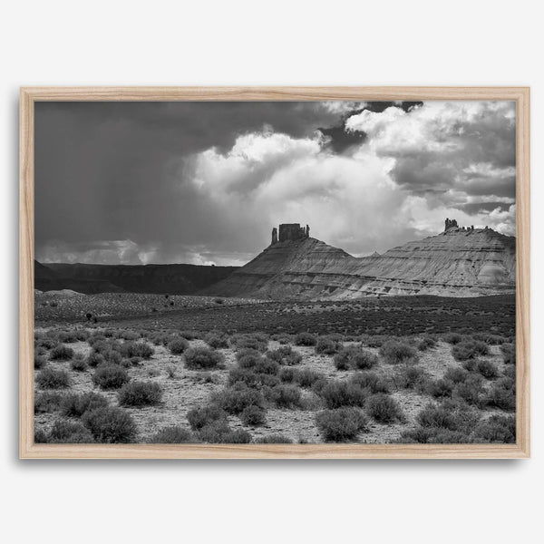 Black and white Utah wall art featuring dramatic desert rock formations and storm clouds