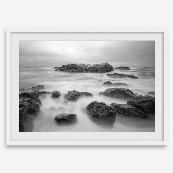 Stunning moody black and white beach fine art print from Pescadero, California. The Pacific Ocean looks creamy in this fine art long-exposure photography print.