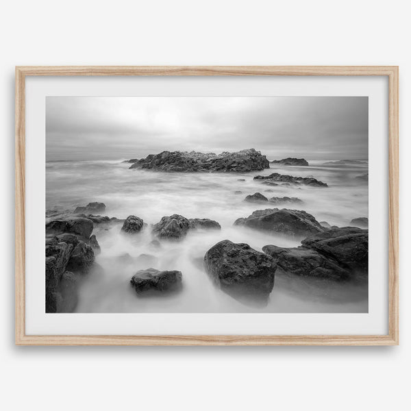 Stunning moody black and white beach fine art print from Pescadero, California. The Pacific Ocean looks creamy in this fine art long-exposure photography print.