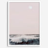 This extraordinary ocean wall art captures a mesmerizing moment when a powerful wave crashes while the sunset gentle blush pink hues fill the sky and a large full moon rises majestically in the backdrop.