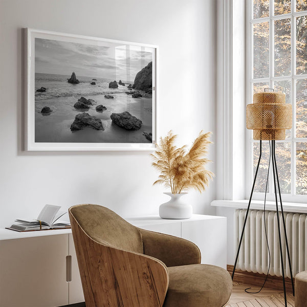 A fine art black and white beach print featuring El Matador State Beach in MalIbu. This southwest coastal decor captures the ragged beauty of the California coast.