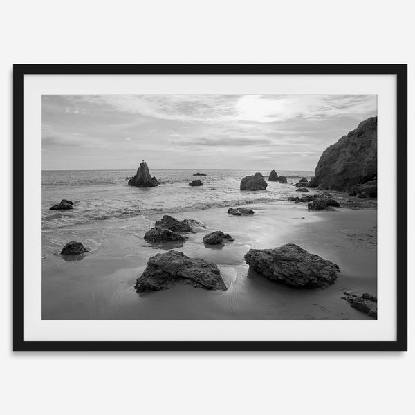 A fine art black and white beach print featuring El Matador State Beach in MalIbu. This southwest coastal decor captures the ragged beauty of the California coast.