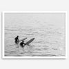 Black and white photo of two surfers with longboards waiting in calm ocean water – fine art surf photography print