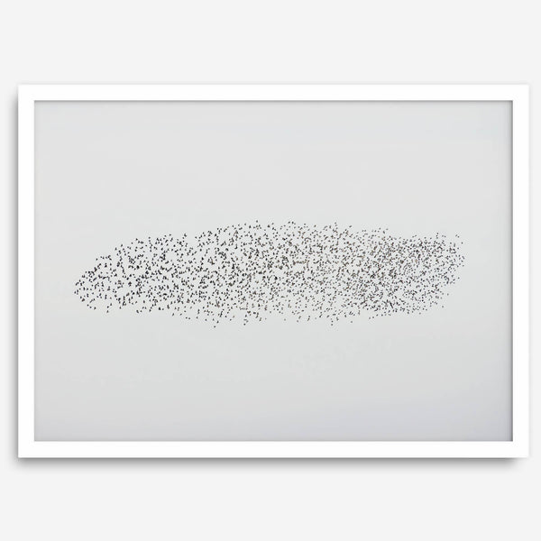 An abstract nature photography landscape photography print featuring a murmuration of starlings in an abstract formation against the sky, capturing minimalist beauty.