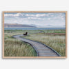 Framed Mono Lake nature photography print featuring a winding boardwalk through tall grasses, leading to a quiet bench beside the lake with mountains in the background.