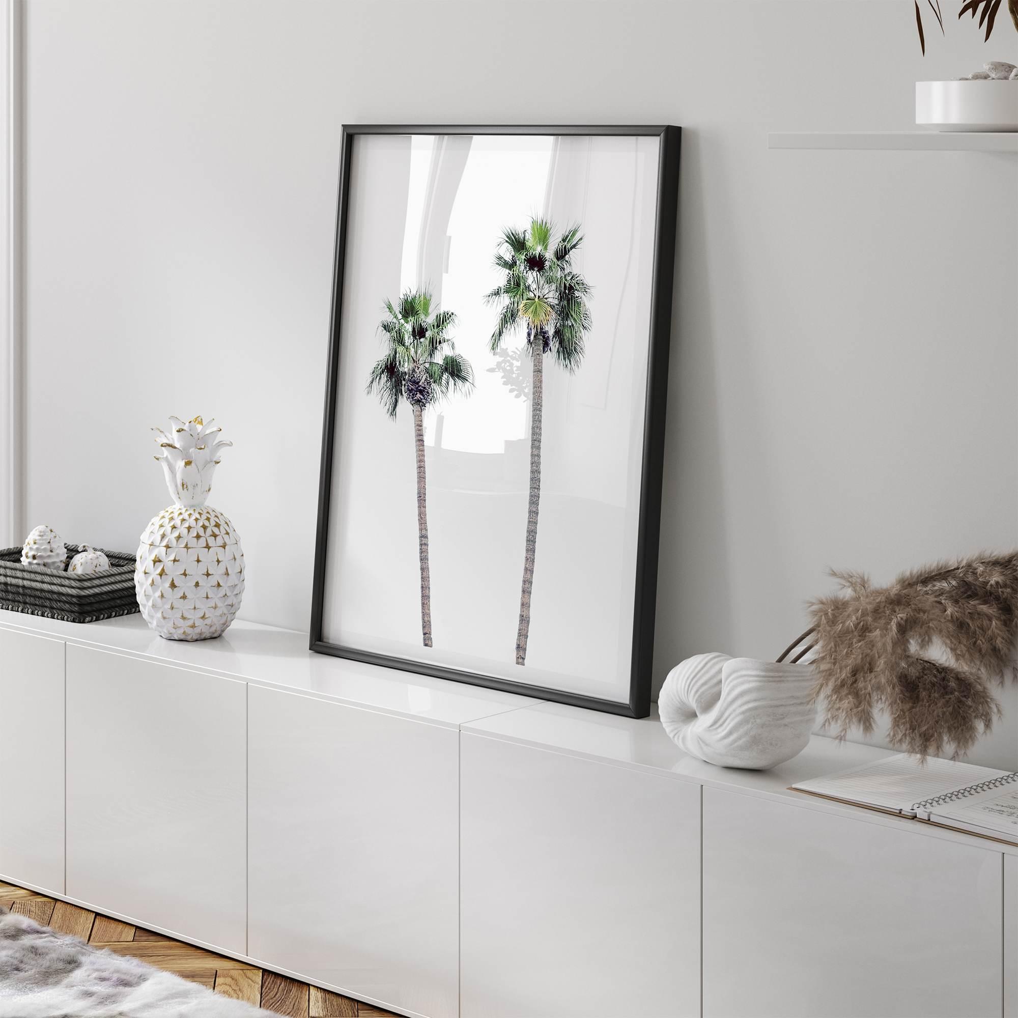 Minimalist fine art beach photography print of two tall palm trees against a white sky. Coastal decor.