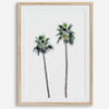 Minimalist fine art beach photography print of two tall palm trees against a white sky. Coastal decor.