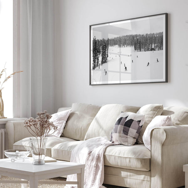 Framed black-and-white ski wall art showing skiers at a snowy resort in Lake Tahoe