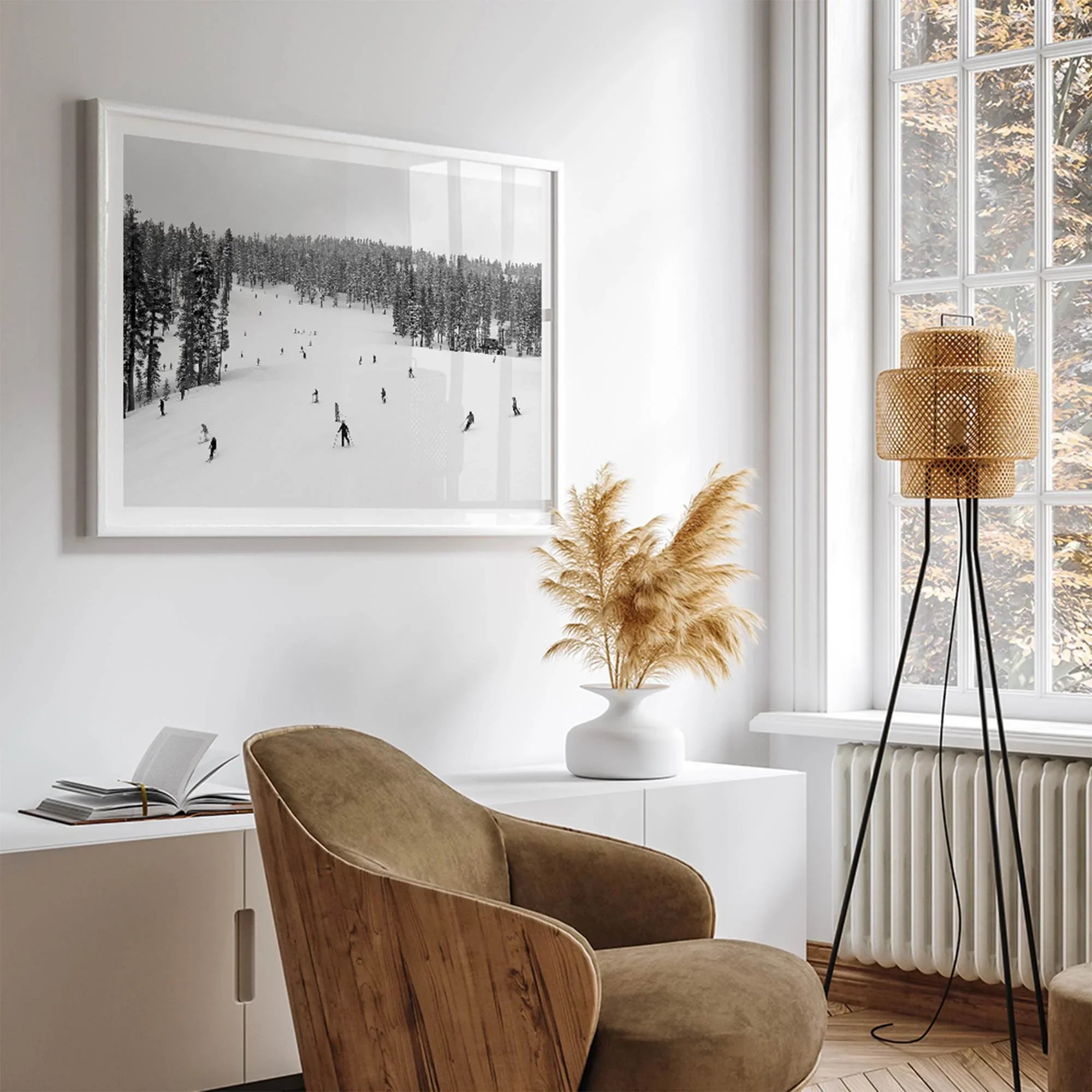 Framed black-and-white ski wall art showing skiers at a snowy resort in Lake Tahoe
