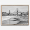 Fine art black and white print of Golden Gate Bridge from Baker Beach, San Francisco. Bridge with reflection in beach surf. Framed or unframed option available