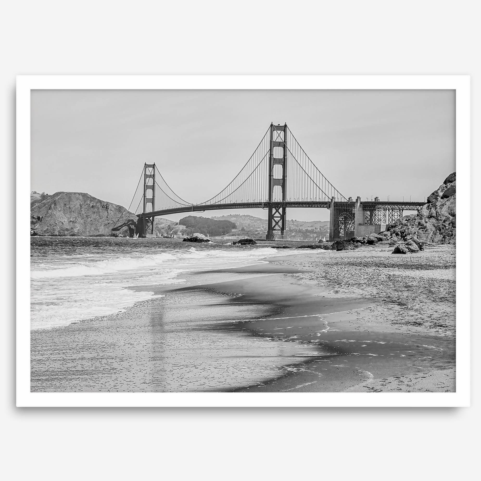 Fine art black and white print of Golden Gate Bridge from Baker Beach, San Francisco. Bridge with reflection in beach surf. Framed or unframed option available