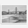 Fine art black and white print of Golden Gate Bridge from Baker Beach, San Francisco. Bridge with reflection in beach surf. Framed or unframed option available
