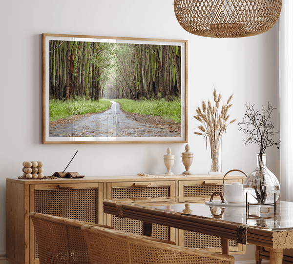 Fine art photography print of a winding road through a eucalyptus forest on the Big Island of Hawaii.