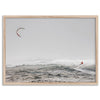 Wind surfer riding waves in Maui with kite above and misty ocean below.