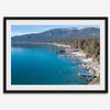 Captivating fine art print of Lake Tahoe showcasing docks, boats, beachfront, lush forest, majestic mountain, and serene waters, capturing the essence of lake life in Incline Village, Nevada.