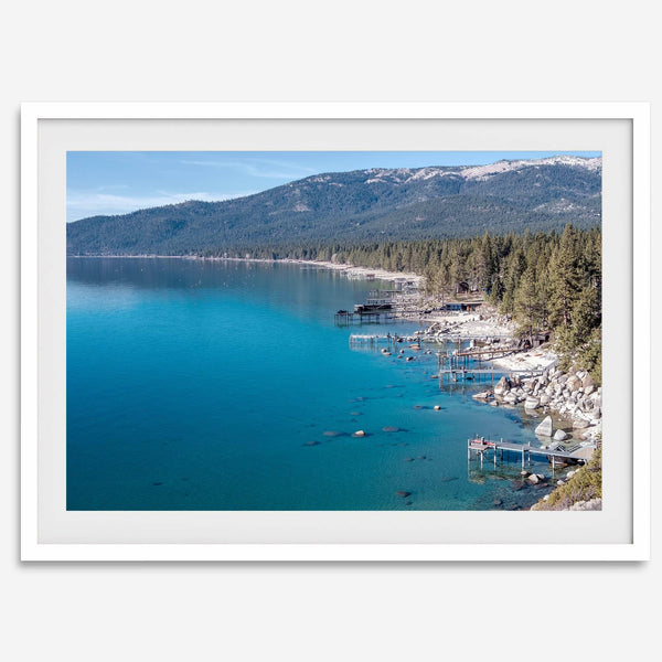Captivating fine art print of Lake Tahoe showcasing docks, boats, beachfront, lush forest, majestic mountain, and serene waters, capturing the essence of lake life in Incline Village, Nevada.