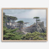 A fine art coastal print showcasing a lone cypress overlooking the ocean in 17 miles drive near Monterey, California. This ocean wall art is available framed or unframed.