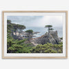 A fine art coastal print showcasing a lone cypress overlooking the ocean in 17 miles drive near Monterey, California. This ocean wall art is available framed or unframed.