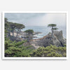 A fine art coastal print showcasing a lone cypress overlooking the ocean in 17 miles drive near Monterey, California. This ocean wall art is available framed or unframed.