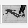 Black and white rollerskate photography taken in San Francisco during Fleet Week, showing a skater’s shadow on concrete, capturing minimalist urban style.