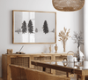 Snowy winter scene artwork with tall pine trees in a peaceful snow-covered field, perfect for minimalist wall decor.