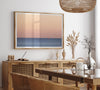 This stunning fine art ocean sunset photography print features a breathtaking scene of a boat against a golden and pink sky at sunset. The warm glow of the sunset and the natural beauty of the ocean and sky combine to create a soothing atmosphere.