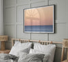 This stunning fine art ocean sunset photography print features a breathtaking scene of a boat against a golden and pink sky at sunset. The warm glow of the sunset and the natural beauty of the ocean and sky combine to create a soothing atmosphere.