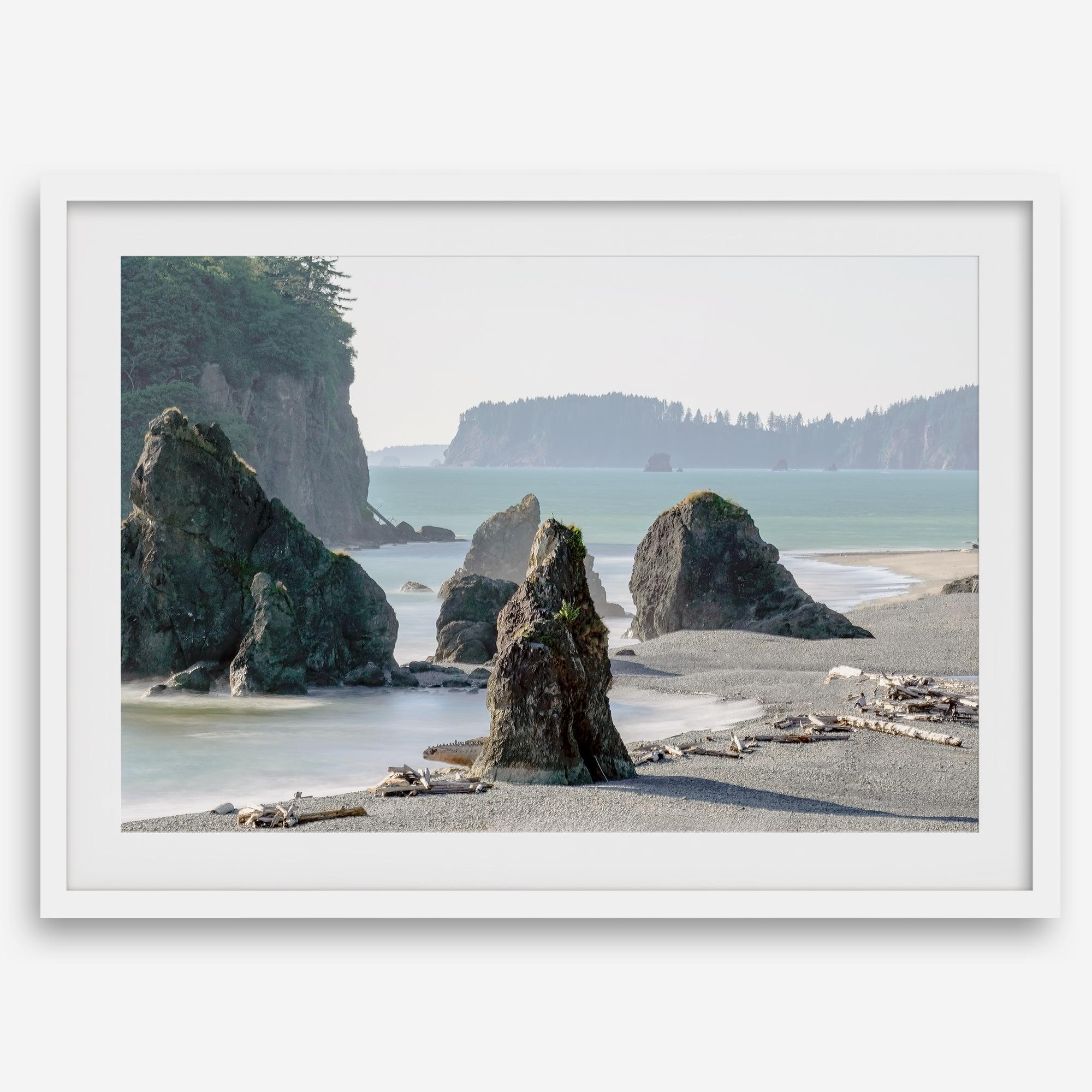 Ruby Beach coastal landscape with towering sea stacks, Pacific Ocean, driftwood and forested cliffs in Olympic National Park, Washington.