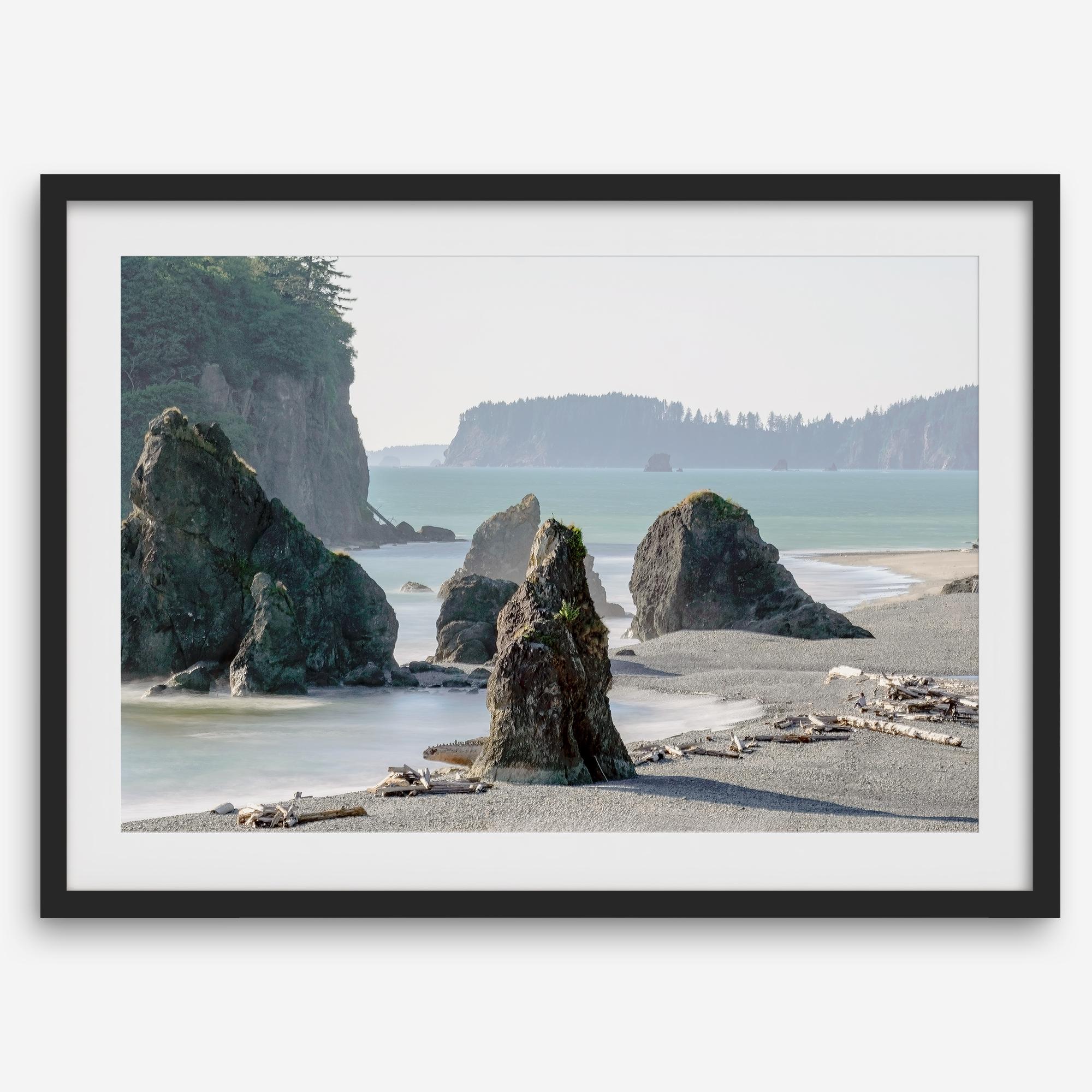 Ruby Beach coastal landscape with towering sea stacks, Pacific Ocean, driftwood and forested cliffs in Olympic National Park, Washington.