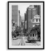 A San Francisco oversized set of 3 framed or unframed wall art. The prints feature a San Francisco cable car overlooking the Bay Bridge, the Golden Gate Bridge from Baker Beach, and the famous Painted Ladies with the San Francisco skyline.