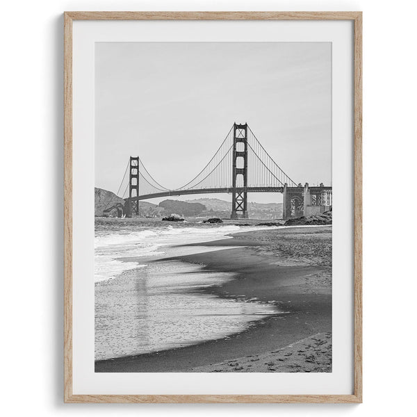 A San Francisco oversized set of 3 framed or unframed wall art. The prints feature a San Francisco cable car overlooking the Bay Bridge, the Golden Gate Bridge from Baker Beach, and the famous Painted Ladies with the San Francisco skyline.