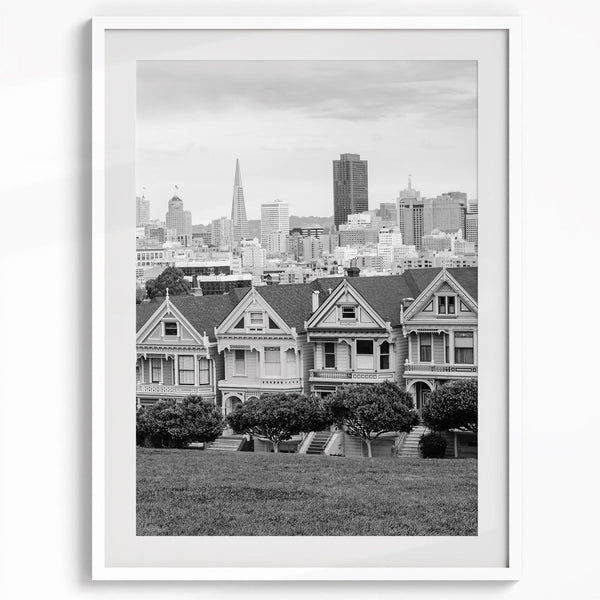 A San Francisco oversized set of 3 framed or unframed wall art. The prints feature a San Francisco cable car overlooking the Bay Bridge, the Golden Gate Bridge from Baker Beach, and the famous Painted Ladies with the San Francisco skyline.