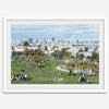 A fine art unframed or framed San Francisco print of Mission Dolores Park showcasing picnic blankets and people enjoying a quiet afternoon with the city skyline in the backdrop.