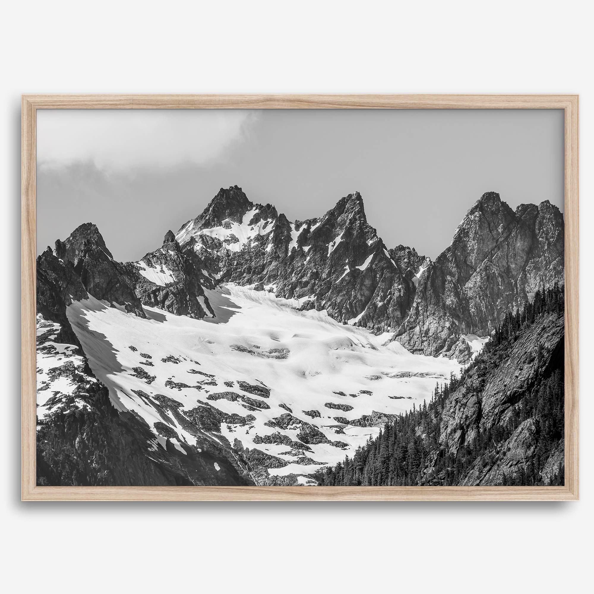 A minimalist black and white unframed or framed photo print of a snowy mountain range in North Cascades National Park, Washington State.