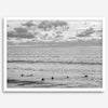 Black and white photo of surfers waiting in the water at sunset in Pismo Beach, California – fine art surf print.