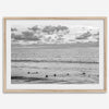 Black and white photo of surfers waiting in the water at sunset in Pismo Beach, California – fine art surf print.