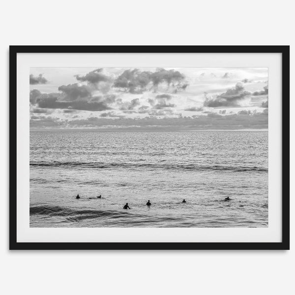 Black and white photo of surfers waiting in the water at sunset in Pismo Beach, California – fine art surf print.