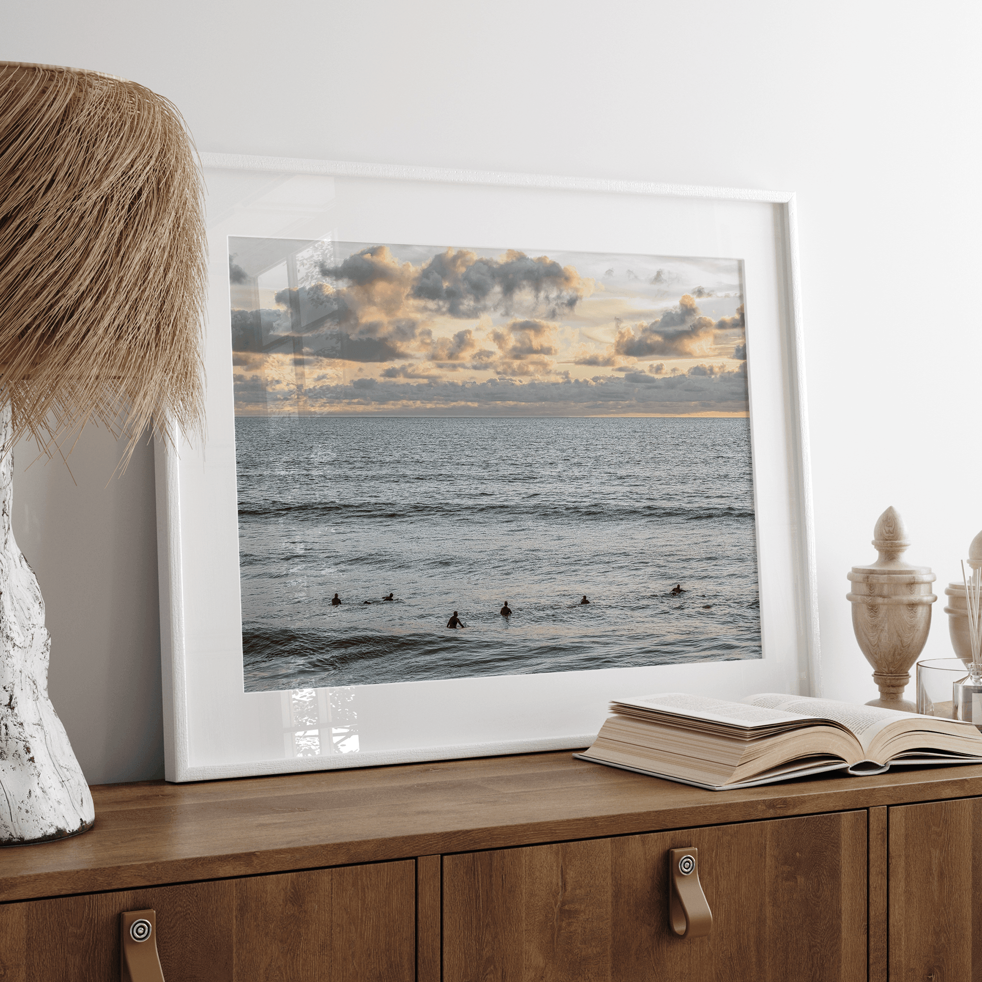 Sunset surf wall art featuring surfers’ silhouettes at Pismo Beach, California, with golden light, calm ocean, and vibrant sunset sky.