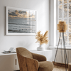 Sunset surf wall art featuring surfers’ silhouettes at Pismo Beach, California, with golden light, calm ocean, and vibrant sunset sky.